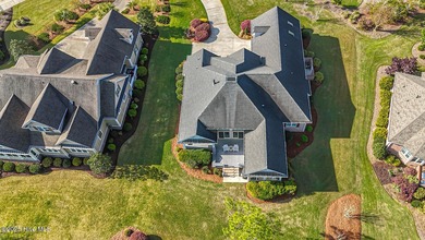 Beautiful low-maintenance brick home with amazing curb appeal on Ocean Ridge Plantation in North Carolina - for sale on GolfHomes.com, golf home, golf lot