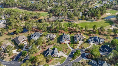 Beautiful low-maintenance brick home with amazing curb appeal on Ocean Ridge Plantation in North Carolina - for sale on GolfHomes.com, golf home, golf lot