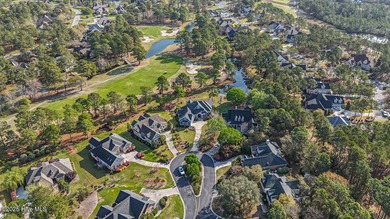 Beautiful low-maintenance brick home with amazing curb appeal on Ocean Ridge Plantation in North Carolina - for sale on GolfHomes.com, golf home, golf lot
