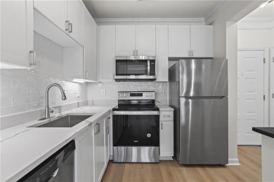 Enjoy resort-style living with a large pool and fully equipped on Art Foundry in Atlantic Station Golf Course in Georgia - for sale on GolfHomes.com, golf home, golf lot