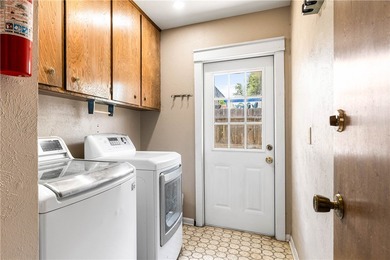 Located in the heart of Corpus Christi, this spacious two-story on Corpus Christi Country Club Golf Course in Texas - for sale on GolfHomes.com, golf home, golf lot