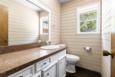 Located in the heart of Corpus Christi, this spacious two-story on Corpus Christi Country Club Golf Course in Texas - for sale on GolfHomes.com, golf home, golf lot