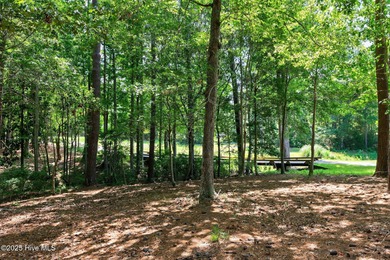 Come build your dream home in a highly sought-after neighborhood on Rivers Edge Golf Club in North Carolina - for sale on GolfHomes.com, golf home, golf lot