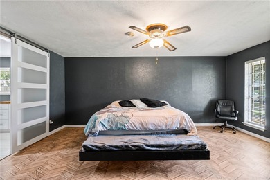 Located in the heart of Corpus Christi, this spacious two-story on Corpus Christi Country Club Golf Course in Texas - for sale on GolfHomes.com, golf home, golf lot