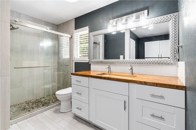 Located in the heart of Corpus Christi, this spacious two-story on Corpus Christi Country Club Golf Course in Texas - for sale on GolfHomes.com, golf home, golf lot