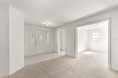MOTIVATED SELLER WILL REVIEW ALL OFFERS! Spacious Hanover Model on On Top of the World Golf Course in Florida - for sale on GolfHomes.com, golf home, golf lot