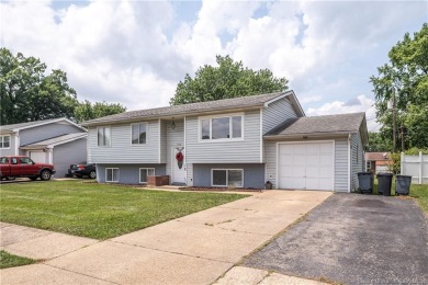 Step Into This Cute Bi-Level, Conveniently Located Near Wooded on Wooded View Golf Course in Indiana - for sale on GolfHomes.com, golf home, golf lot