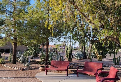 This exceptionally beautifully updated single-level end-unit on Apache Wells Country Club in Arizona - for sale on GolfHomes.com, golf home, golf lot