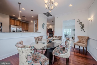 Resort-style living at its finest in this quiet, top-floor end on The Peninsula Golf and Country Club in Delaware - for sale on GolfHomes.com, golf home, golf lot