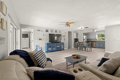 Welcome to effortless Florida living in this beautifully on The Dunedin Country Club in Florida - for sale on GolfHomes.com, golf home, golf lot