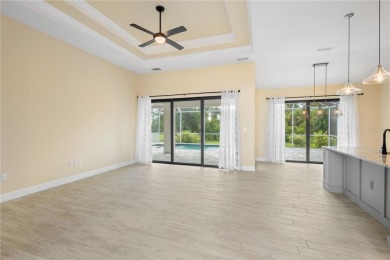 Welcome to this exquisite residence featuring three bedrooms on Rotonda Golf and Country Club - Long Marsh  in Florida - for sale on GolfHomes.com, golf home, golf lot