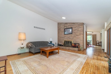 Experience the perfect blend of timeless design and modern on Ann Arbor Country Club in Michigan - for sale on GolfHomes.com, golf home, golf lot