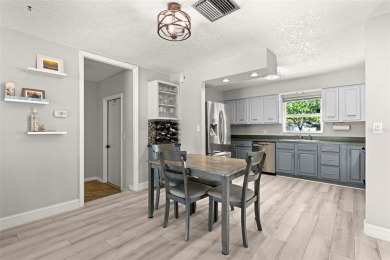 Welcome to effortless Florida living in this beautifully on The Dunedin Country Club in Florida - for sale on GolfHomes.com, golf home, golf lot