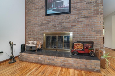 Experience the perfect blend of timeless design and modern on Ann Arbor Country Club in Michigan - for sale on GolfHomes.com, golf home, golf lot