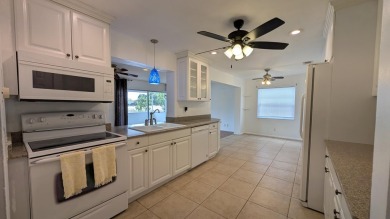 The seller is having a NEW ROOF installed in a few weeks. You on Forest Oaks Golf Club in Florida - for sale on GolfHomes.com, golf home, golf lot