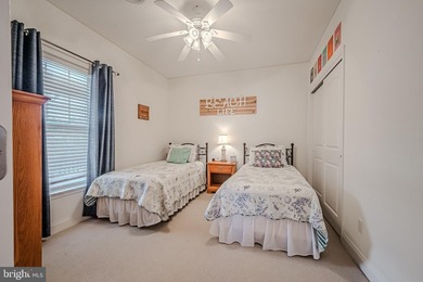 Resort-style living at its finest in this quiet, top-floor end on The Peninsula Golf and Country Club in Delaware - for sale on GolfHomes.com, golf home, golf lot