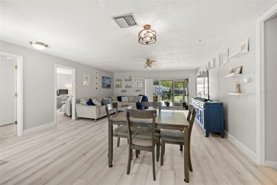 Welcome to effortless Florida living in this beautifully on The Dunedin Country Club in Florida - for sale on GolfHomes.com, golf home, golf lot