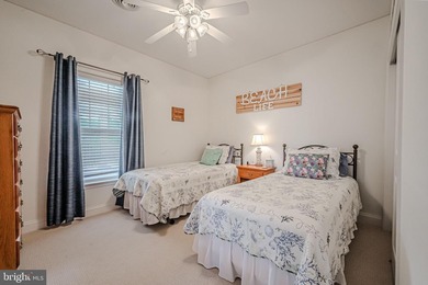 Resort-style living at its finest in this quiet, top-floor end on The Peninsula Golf and Country Club in Delaware - for sale on GolfHomes.com, golf home, golf lot