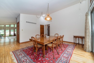 Experience the perfect blend of timeless design and modern on Ann Arbor Country Club in Michigan - for sale on GolfHomes.com, golf home, golf lot