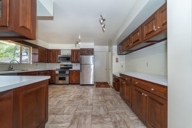 Experience the perfect blend of timeless design and modern on Ann Arbor Country Club in Michigan - for sale on GolfHomes.com, golf home, golf lot