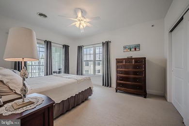 Resort-style living at its finest in this quiet, top-floor end on The Peninsula Golf and Country Club in Delaware - for sale on GolfHomes.com, golf home, golf lot