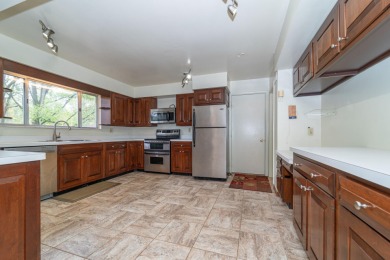 Experience the perfect blend of timeless design and modern on Ann Arbor Country Club in Michigan - for sale on GolfHomes.com, golf home, golf lot