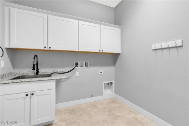 This charming one-story home sits on the golf course with views on Mountain Falls Golf Course in Nevada - for sale on GolfHomes.com, golf home, golf lot