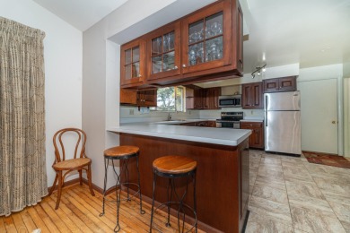 Experience the perfect blend of timeless design and modern on Ann Arbor Country Club in Michigan - for sale on GolfHomes.com, golf home, golf lot
