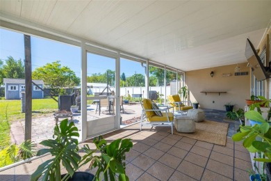 Welcome to effortless Florida living in this beautifully on The Dunedin Country Club in Florida - for sale on GolfHomes.com, golf home, golf lot