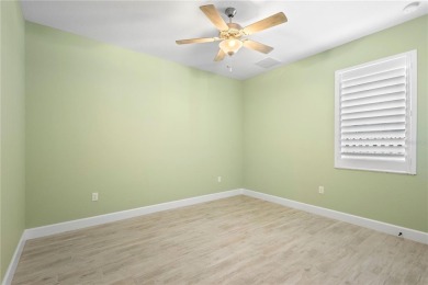 Welcome to this exquisite residence featuring three bedrooms on Rotonda Golf and Country Club - Long Marsh  in Florida - for sale on GolfHomes.com, golf home, golf lot