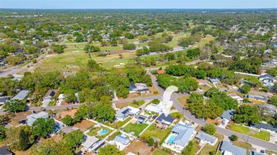 Welcome to effortless Florida living in this beautifully on The Dunedin Country Club in Florida - for sale on GolfHomes.com, golf home, golf lot