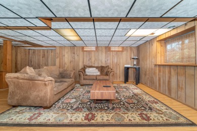 Experience the perfect blend of timeless design and modern on Ann Arbor Country Club in Michigan - for sale on GolfHomes.com, golf home, golf lot