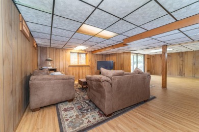 Experience the perfect blend of timeless design and modern on Ann Arbor Country Club in Michigan - for sale on GolfHomes.com, golf home, golf lot