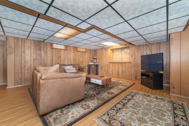 Experience the perfect blend of timeless design and modern on Ann Arbor Country Club in Michigan - for sale on GolfHomes.com, golf home, golf lot