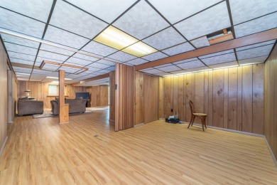 Experience the perfect blend of timeless design and modern on Ann Arbor Country Club in Michigan - for sale on GolfHomes.com, golf home, golf lot