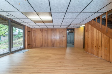 Experience the perfect blend of timeless design and modern on Ann Arbor Country Club in Michigan - for sale on GolfHomes.com, golf home, golf lot