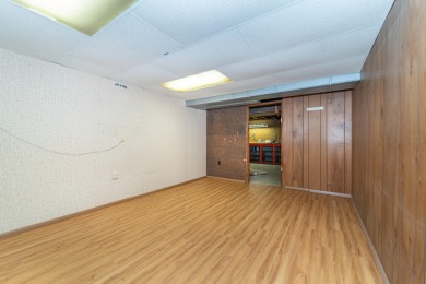 Experience the perfect blend of timeless design and modern on Ann Arbor Country Club in Michigan - for sale on GolfHomes.com, golf home, golf lot