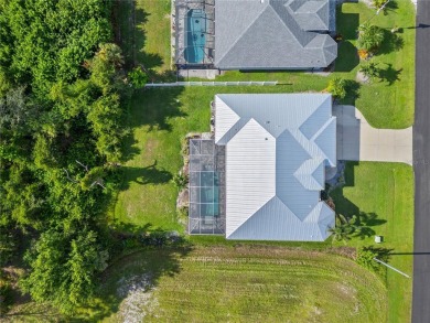 Welcome to this exquisite residence featuring three bedrooms on Rotonda Golf and Country Club - Long Marsh  in Florida - for sale on GolfHomes.com, golf home, golf lot