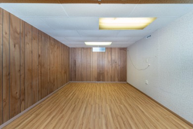 Experience the perfect blend of timeless design and modern on Ann Arbor Country Club in Michigan - for sale on GolfHomes.com, golf home, golf lot