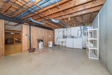 Experience the perfect blend of timeless design and modern on Ann Arbor Country Club in Michigan - for sale on GolfHomes.com, golf home, golf lot