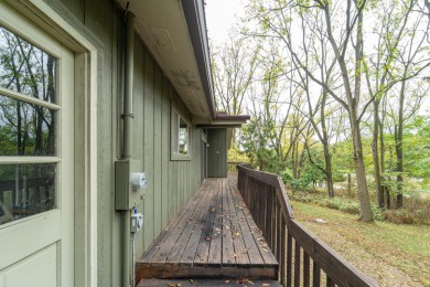 Experience the perfect blend of timeless design and modern on Ann Arbor Country Club in Michigan - for sale on GolfHomes.com, golf home, golf lot