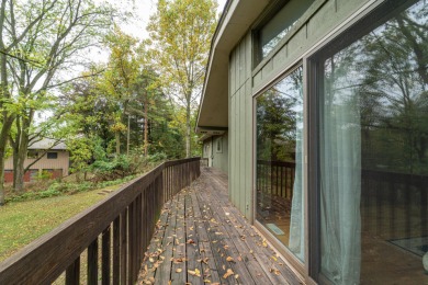 Experience the perfect blend of timeless design and modern on Ann Arbor Country Club in Michigan - for sale on GolfHomes.com, golf home, golf lot