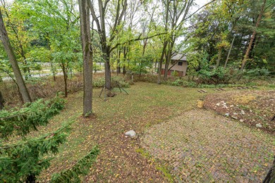 Experience the perfect blend of timeless design and modern on Ann Arbor Country Club in Michigan - for sale on GolfHomes.com, golf home, golf lot