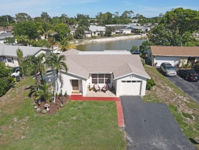 NEW ROOF installed 8/11/2025. You will love this large 2 bedroom on Forest Oaks Golf Club in Florida - for sale on GolfHomes.com, golf home, golf lot