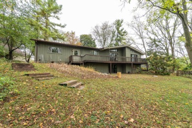 Experience the perfect blend of timeless design and modern on Ann Arbor Country Club in Michigan - for sale on GolfHomes.com, golf home, golf lot