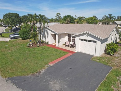 NEW ROOF installed 8/11/2025. You will love this large 2 bedroom on Forest Oaks Golf Club in Florida - for sale on GolfHomes.com, golf home, golf lot