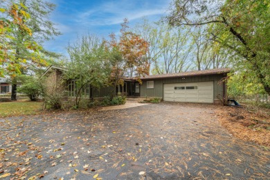 Experience the perfect blend of timeless design and modern on Ann Arbor Country Club in Michigan - for sale on GolfHomes.com, golf home, golf lot