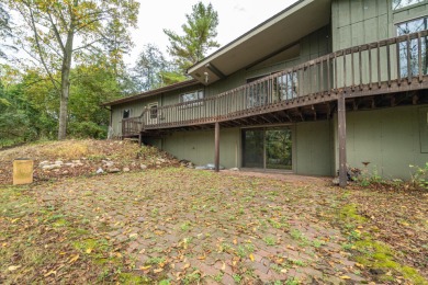 Experience the perfect blend of timeless design and modern on Ann Arbor Country Club in Michigan - for sale on GolfHomes.com, golf home, golf lot
