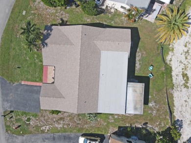 NEW ROOF installed 8/11/2025. You will love this large 2 bedroom on Forest Oaks Golf Club in Florida - for sale on GolfHomes.com, golf home, golf lot