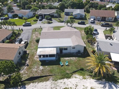 NEW ROOF installed 8/11/2025. You will love this large 2 bedroom on Forest Oaks Golf Club in Florida - for sale on GolfHomes.com, golf home, golf lot